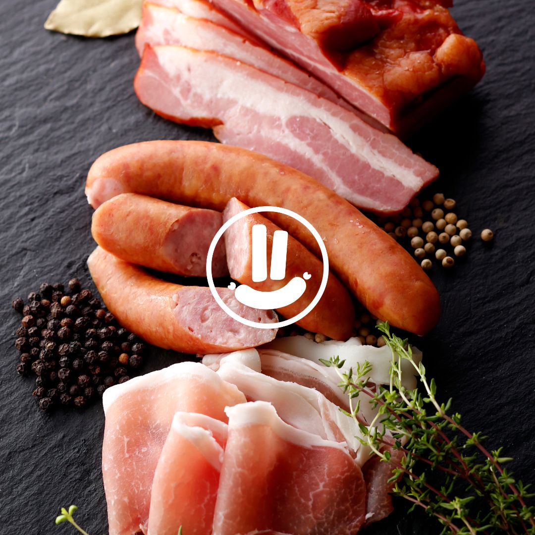 How do Jill’s Sausages ham and bacon products maintain a pinkish colour of regular cured meats